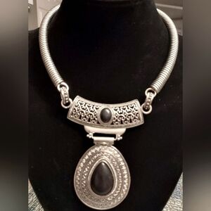 𝅺PROWLING Prowess silver tone with a black cabochon